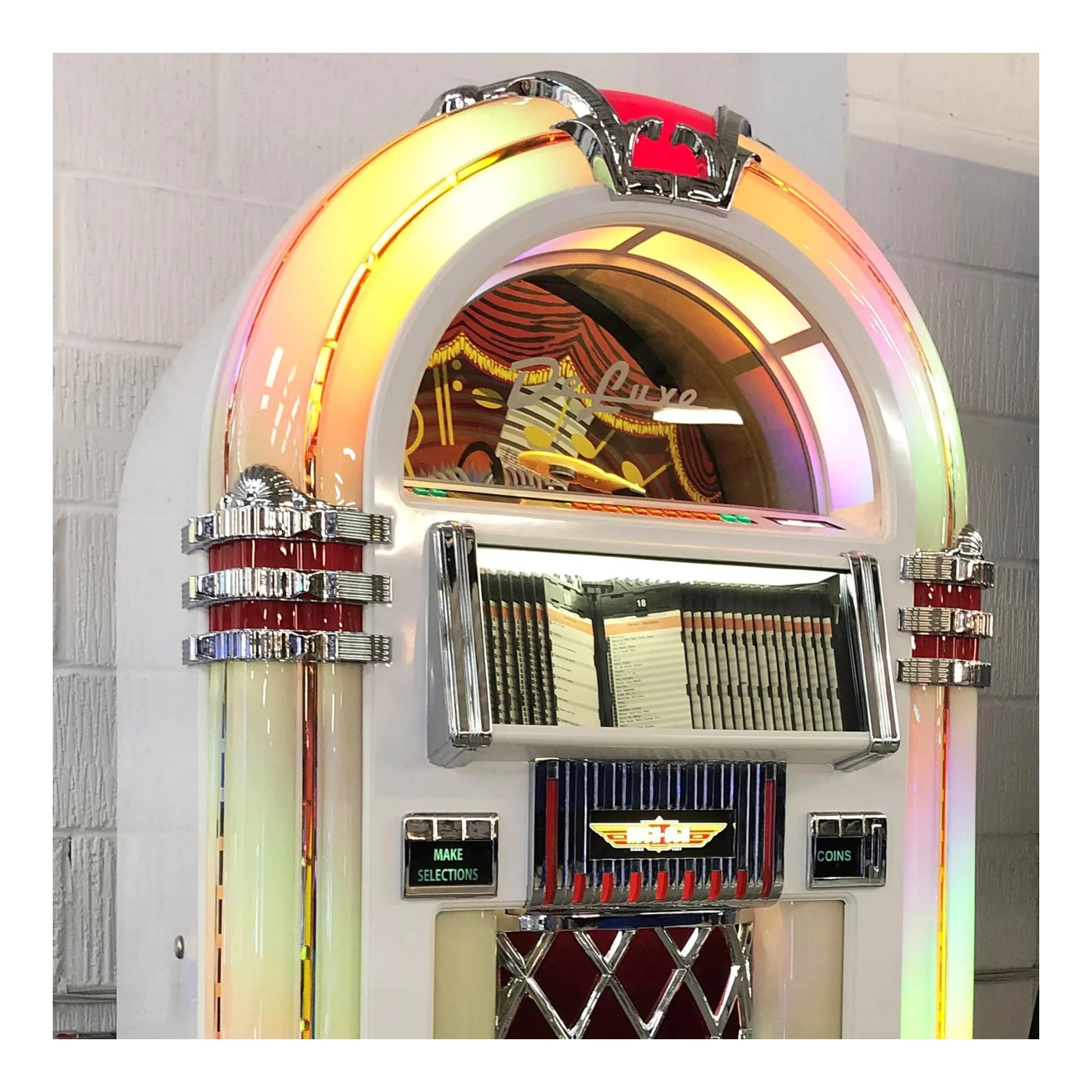 Close-up of the Rock-Ola Bubbler's illuminated title card and selection buttons.