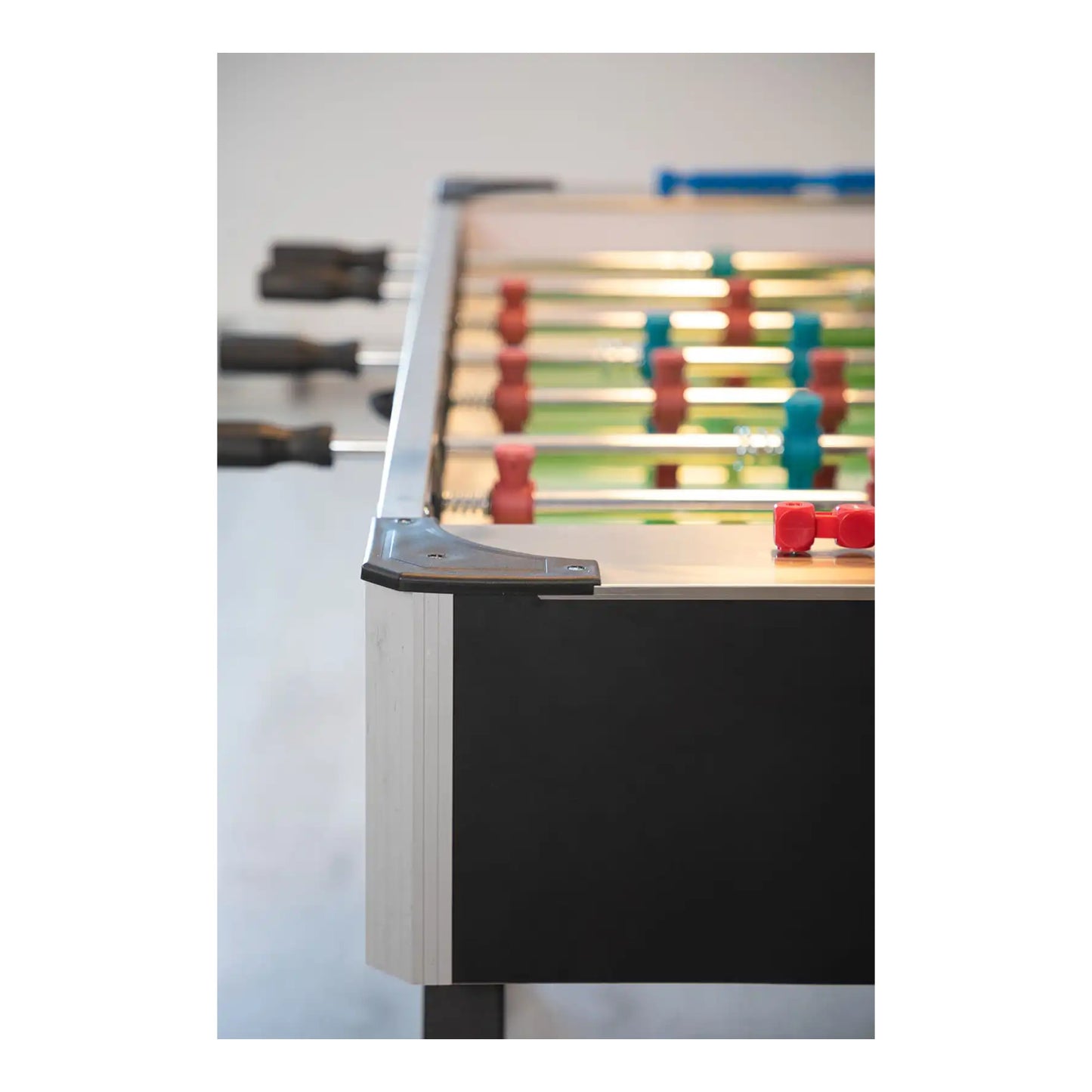 Side profile of Master Speed Foosball Table showing tubular steel legs and reinforcement bar