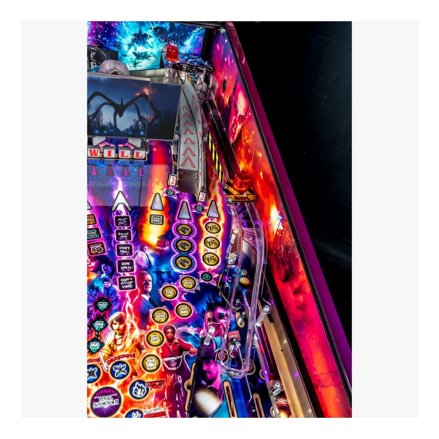 Colorful pinball machine with vibrant lights and graphics