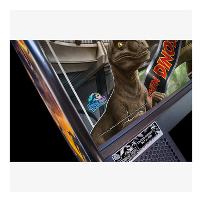 Stuffed dinosaur toy inside a vehicle with visible stickers on the window.