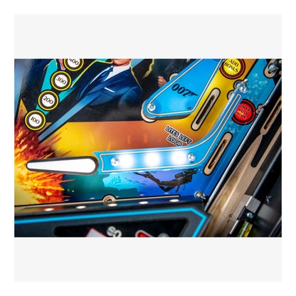 Close-up of a colorful pinball machine with vibrant graphics and text.