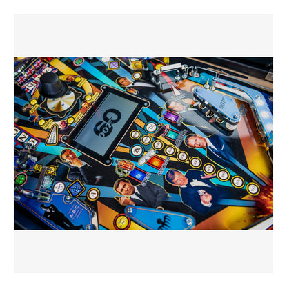 Close-up of a colorful pinball machine with various elements and characters on a white background
