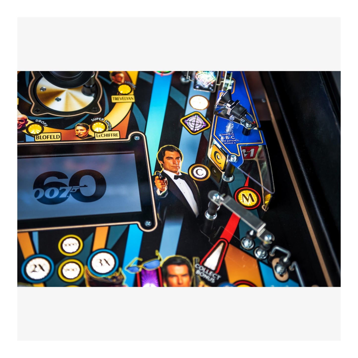 Pinball machine with James Bond theme featuring a man in a tuxedo and '007' branding.