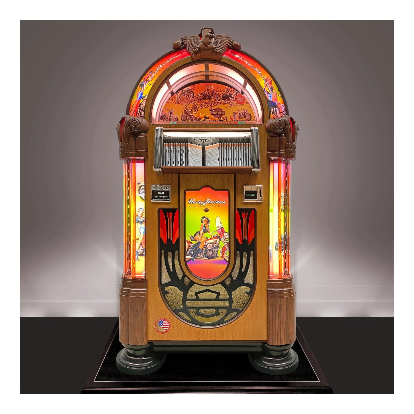 Vintage-style jukebox with colorful display on a gray background
