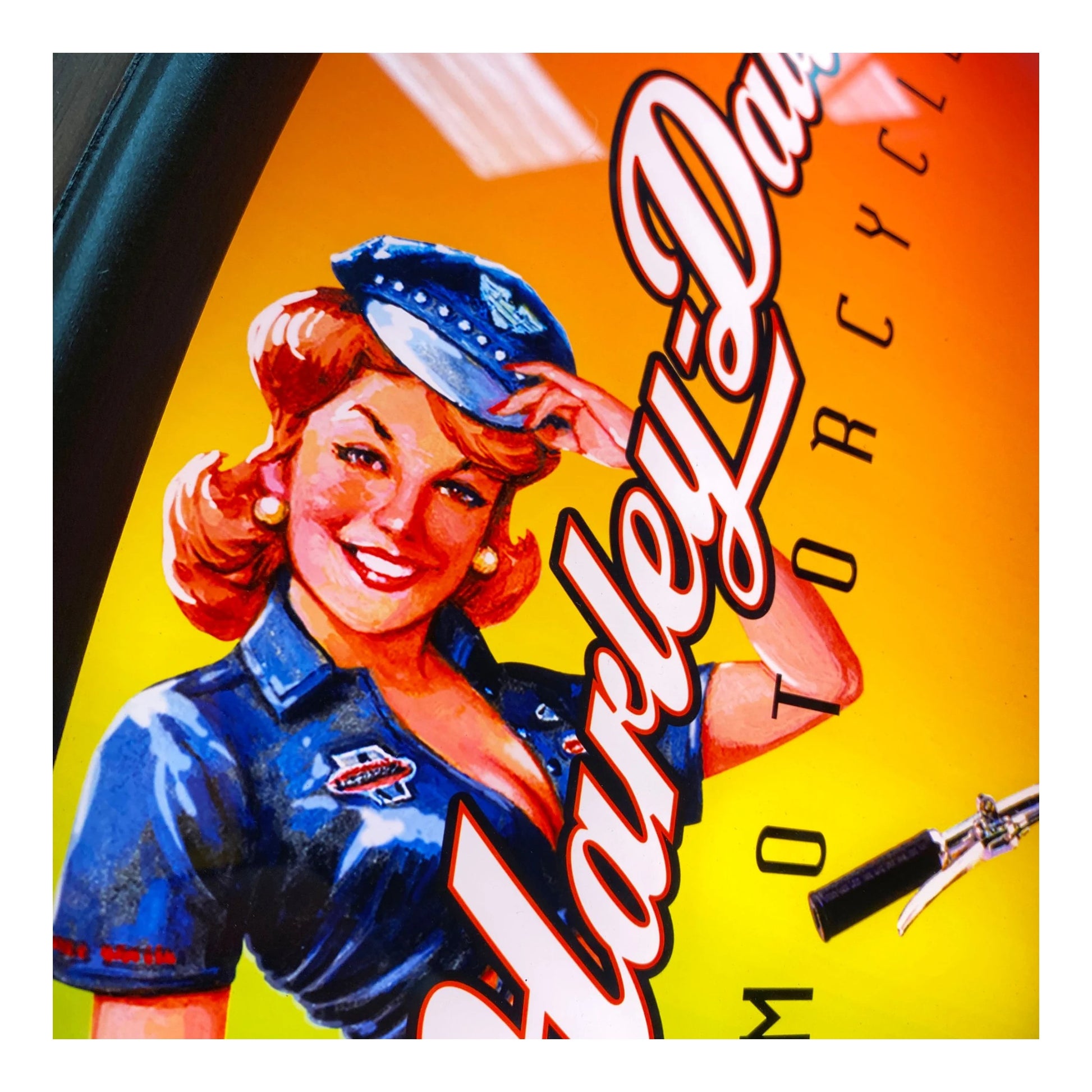 Vintage-style advertisement with a woman in a blue uniform and cap, featuring the Harley-Davidson logo.