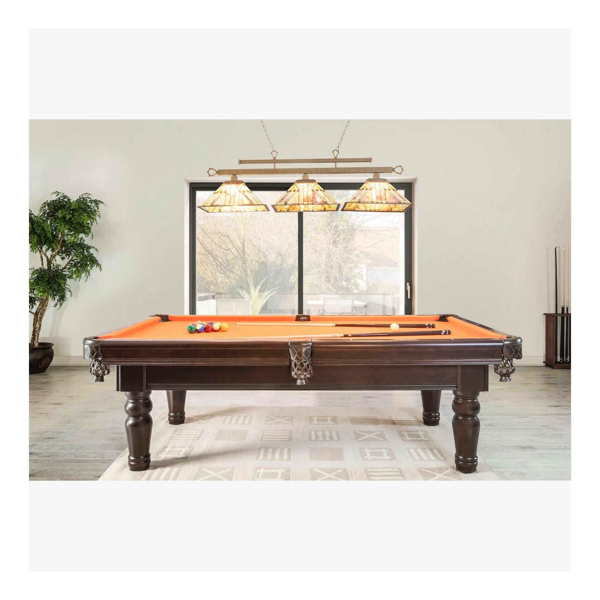 A side profile view of the Aristocrat pool table, highlighting the classic, elegant lines of its legs and frame.