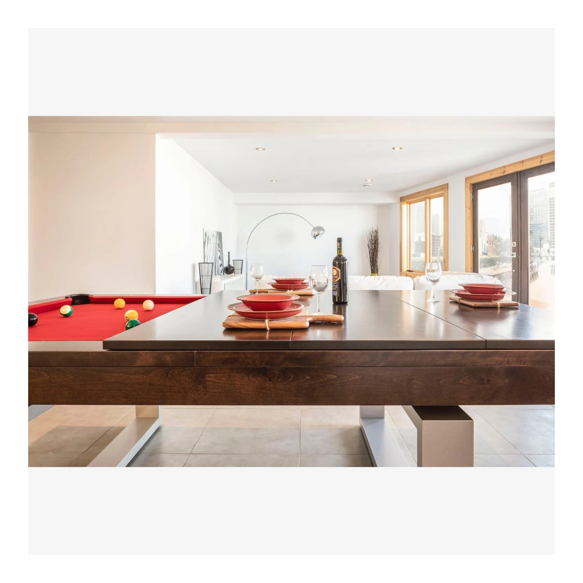 A close-up of the Bridge Aluminum pool table's aluminum leg and solid wood corner, showcasing its modern, urban design.