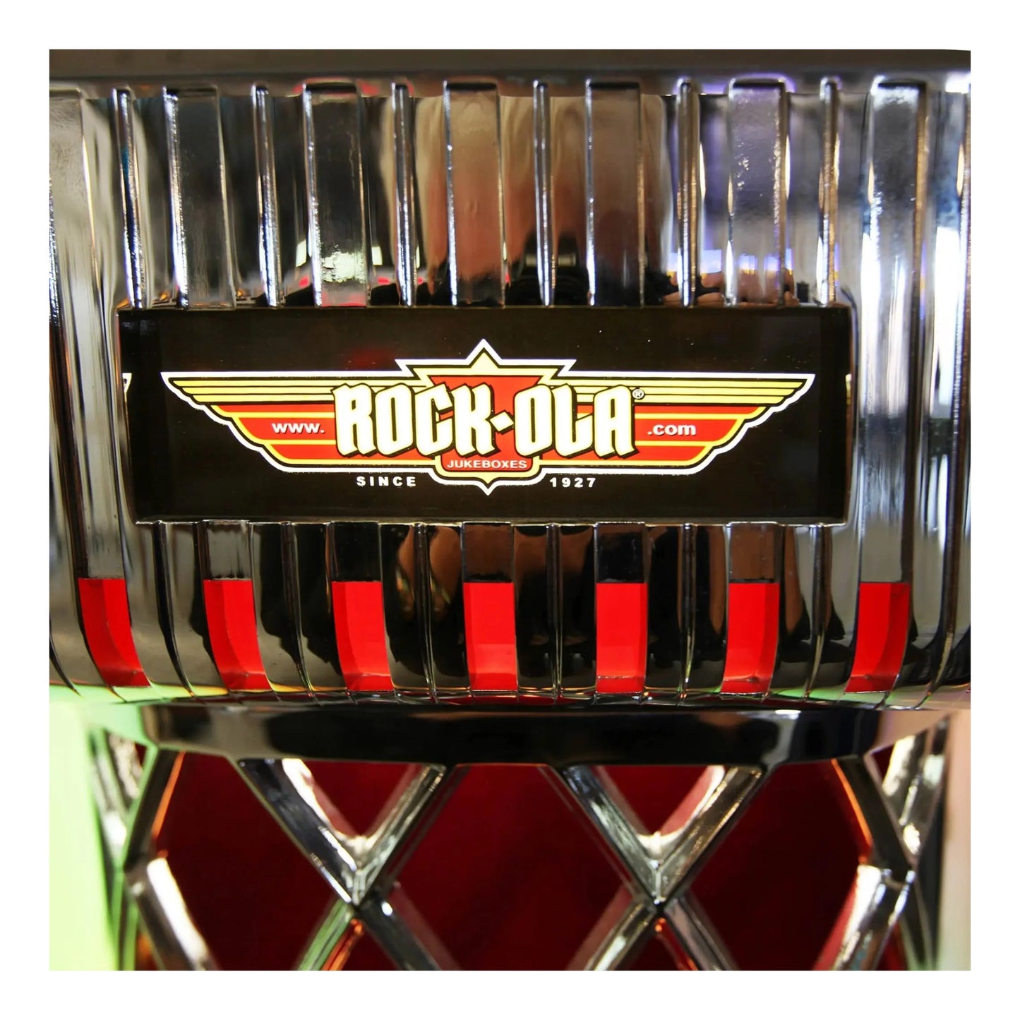 Close-up of the Rock-Ola Bubbler's illuminated title card and selection buttons.