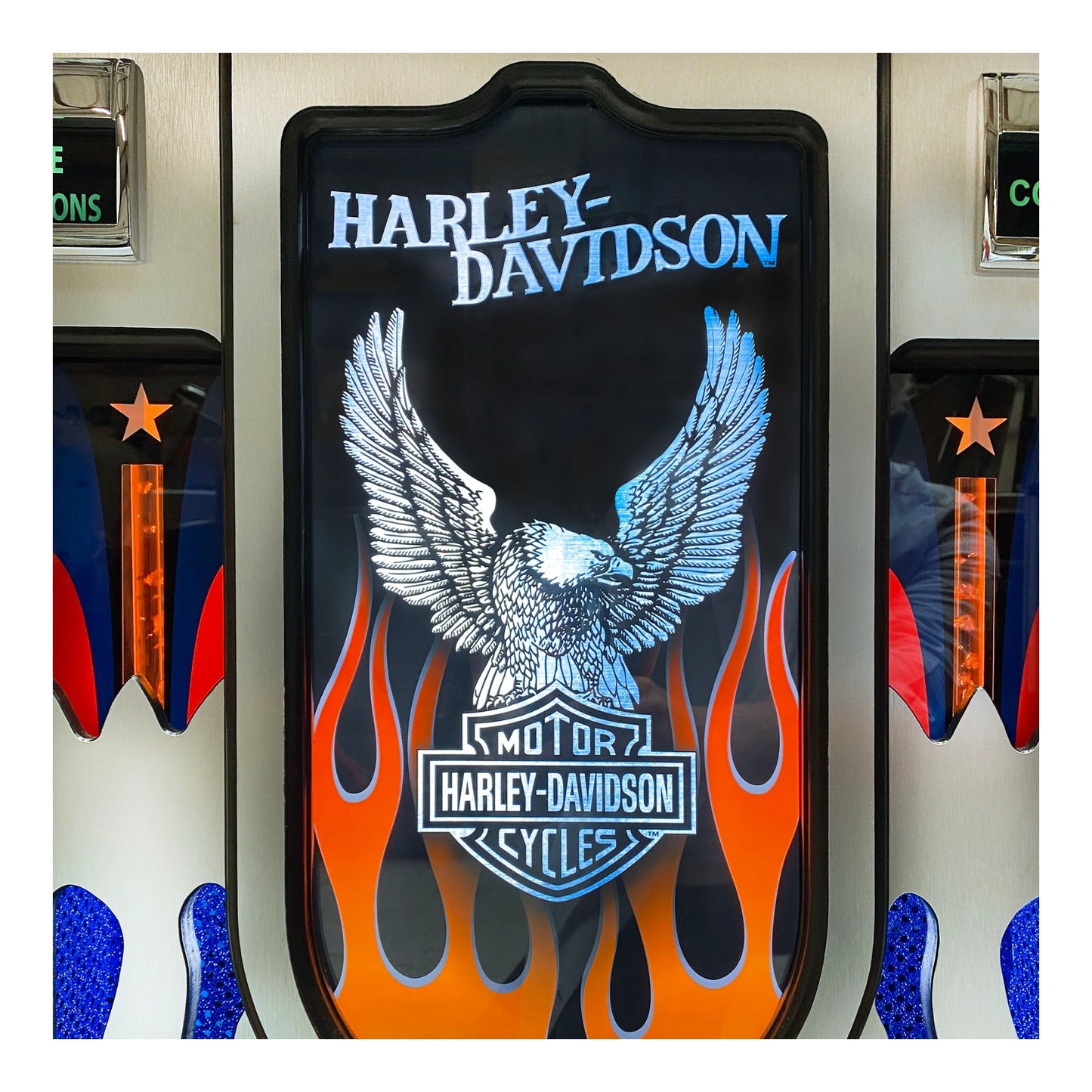 Harley-Davidson logo with an eagle and flames on a black background