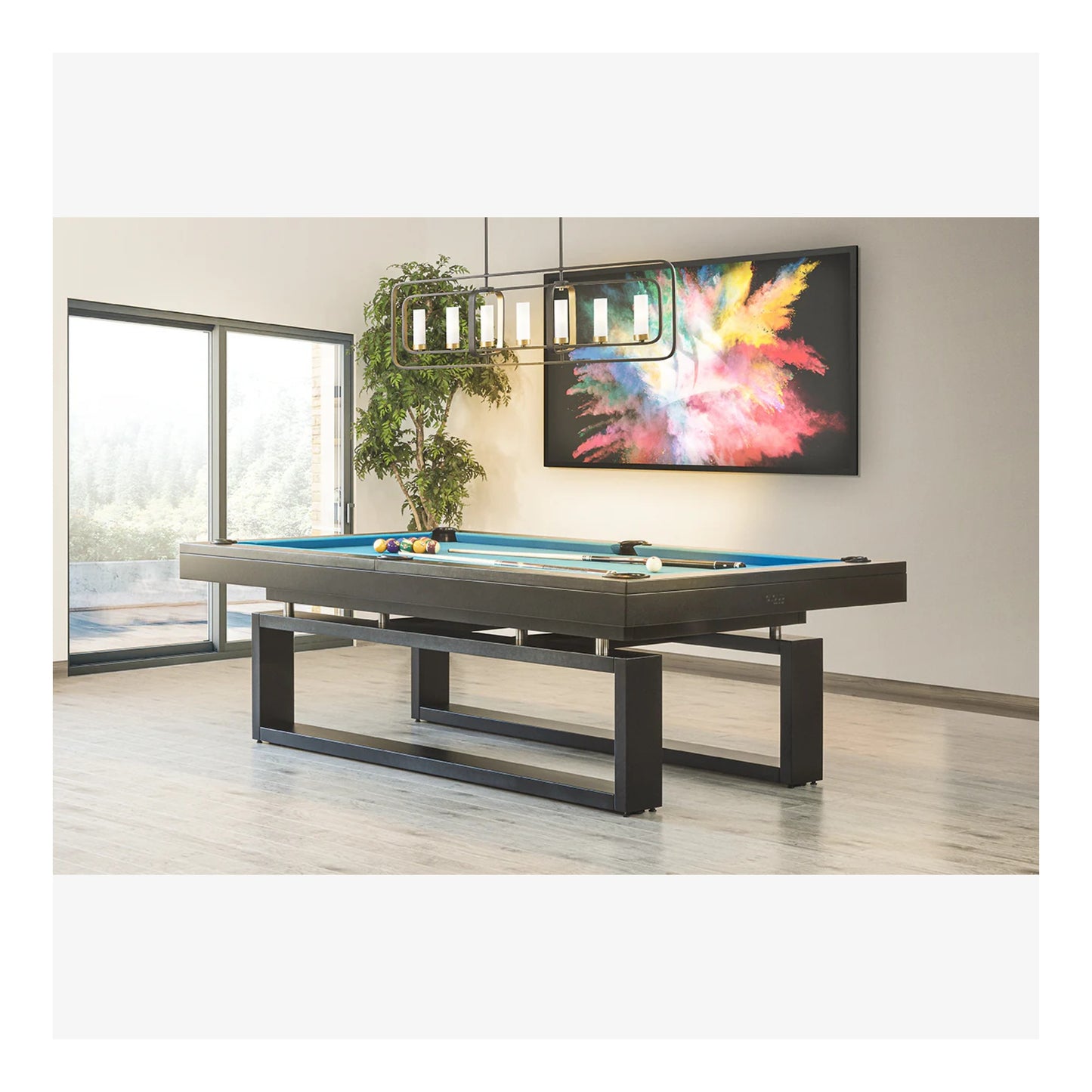 The Cloud modern pool table shown with electric blue felt in a bright, contemporary room, highlighting its "floating" leg design.