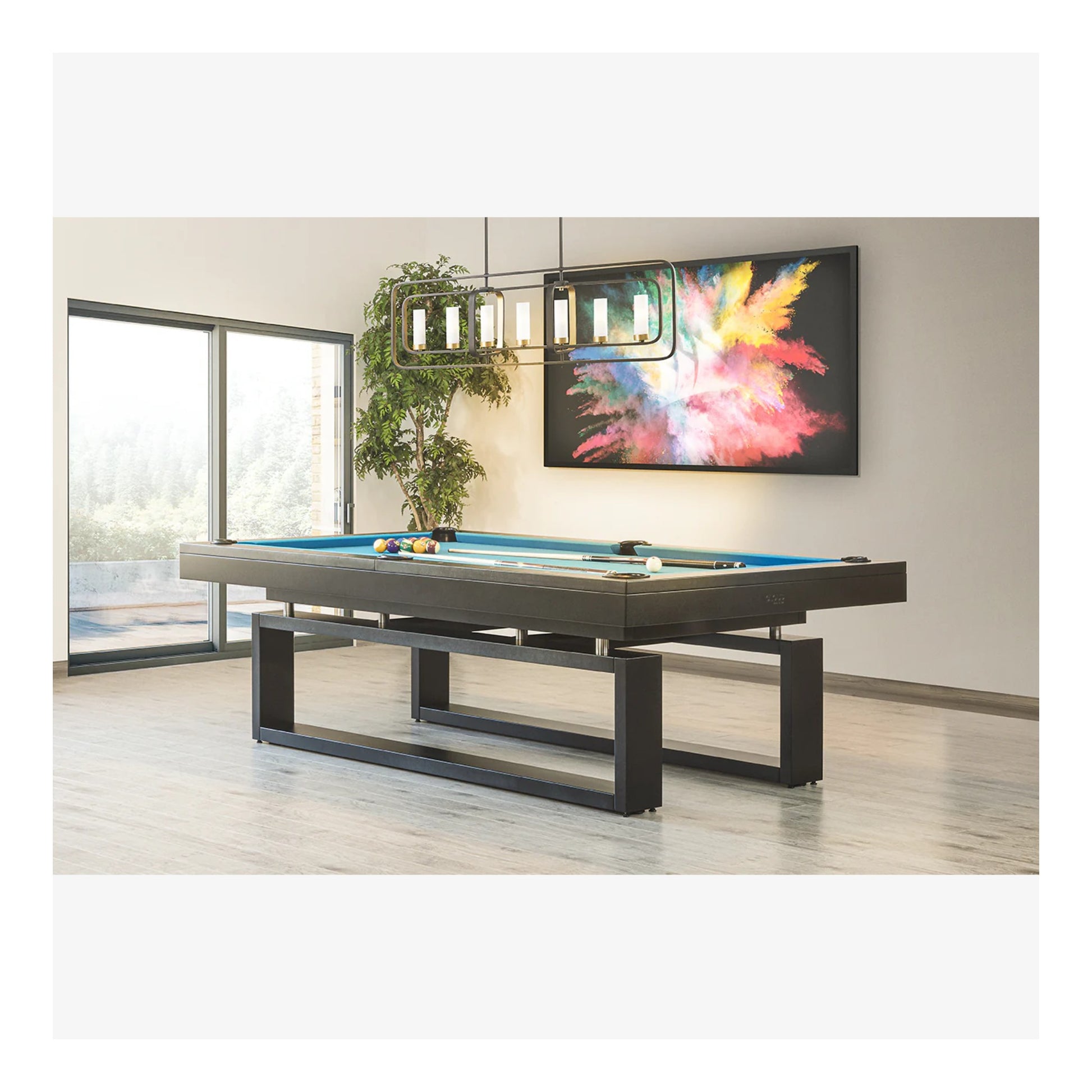 The Cloud modern pool table shown with electric blue felt in a bright, contemporary room, highlighting its "floating" leg design.
