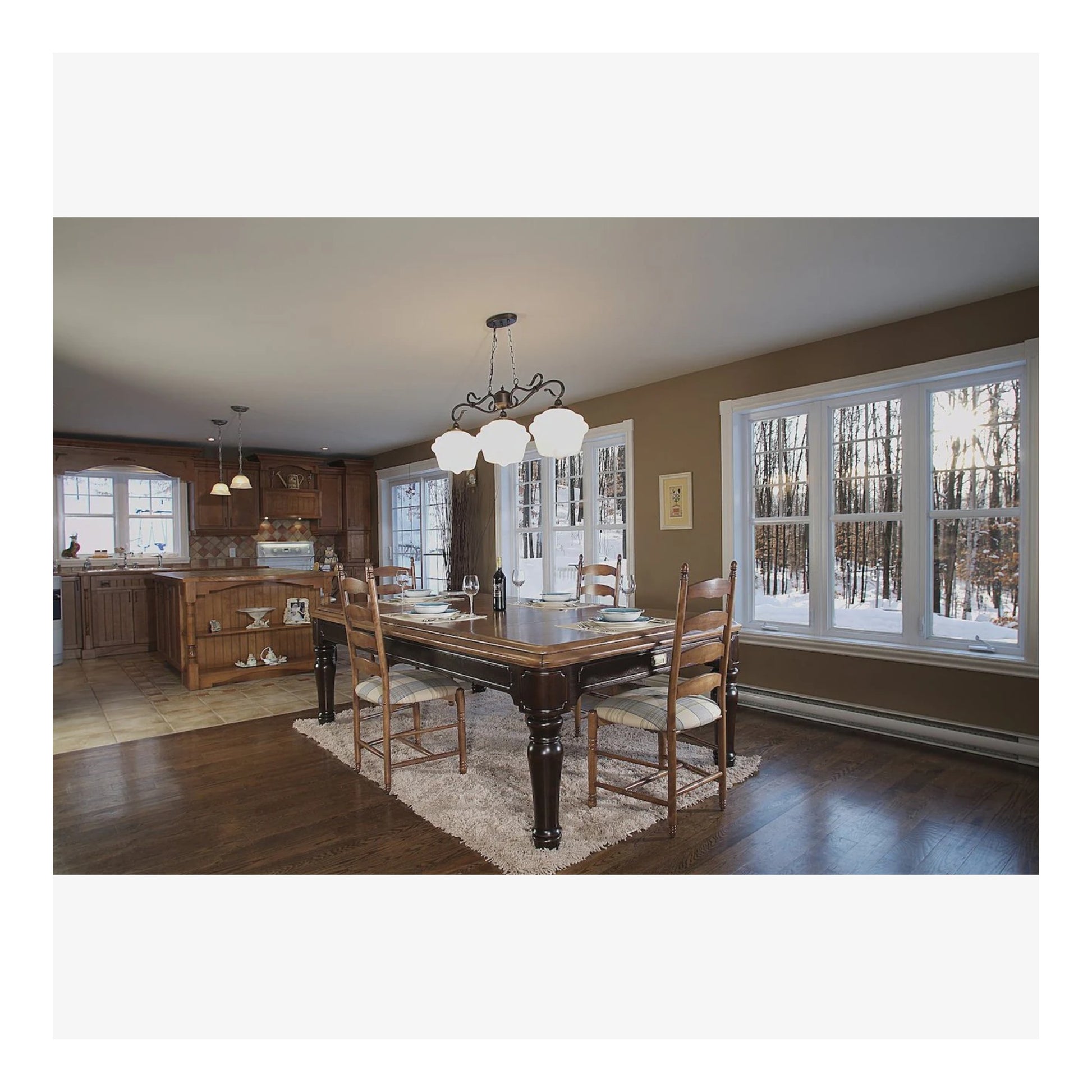 The Colonial convertible pool table by Canada Billiard, shown as a dining table in a rustic dining room.