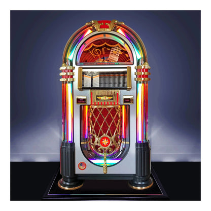 The Rock-Ola Crystal Edition jukebox on a display plinth, showing the bi-metallic design.
