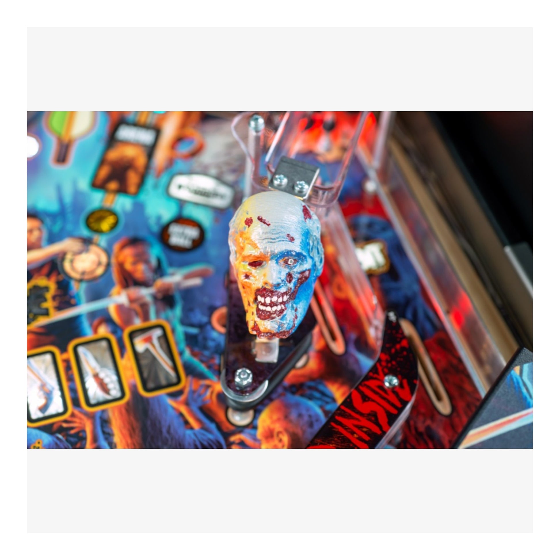 Premium Stern Pinball The Walking Dead.  Close-up of a pinball machine with a zombie-themed playfield