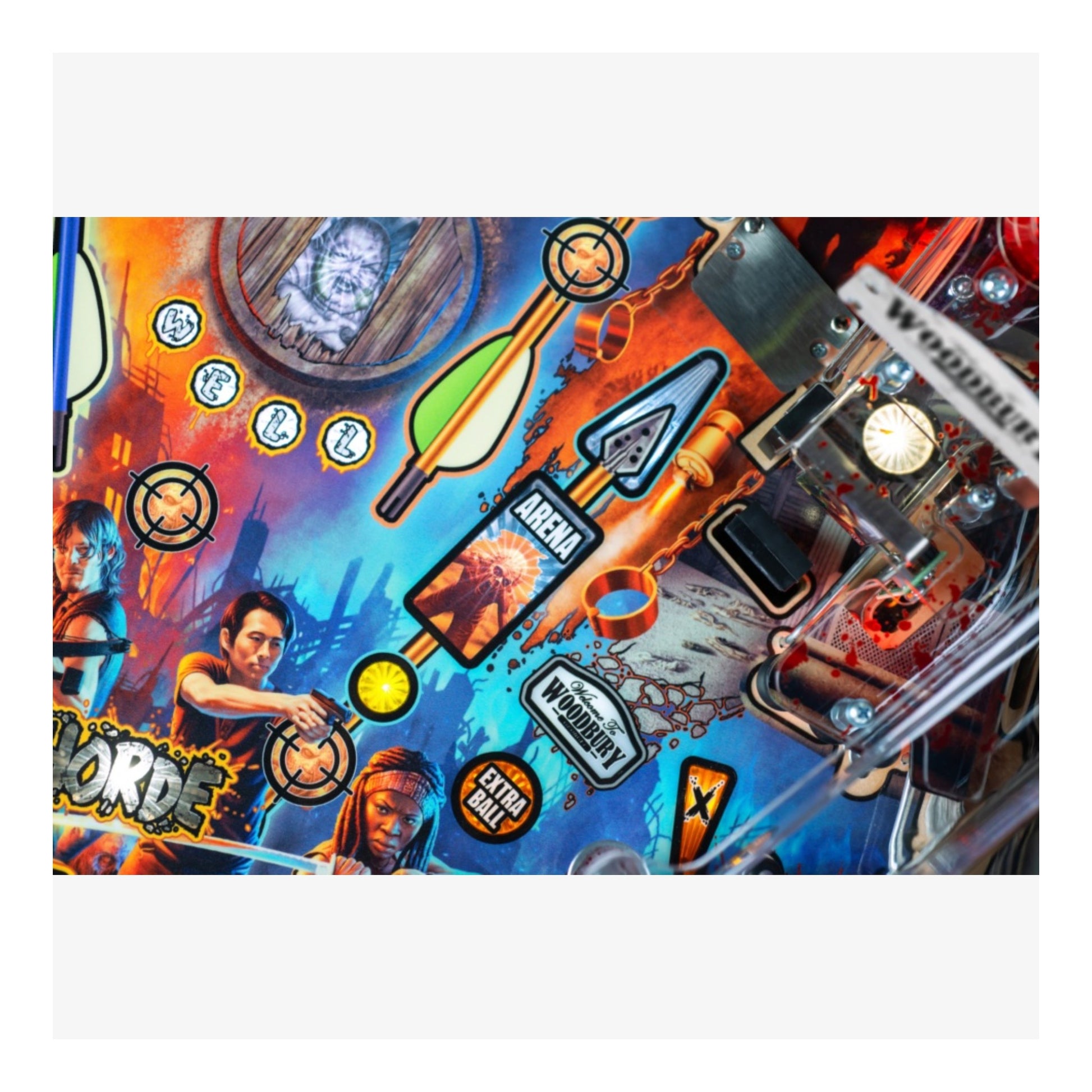 Premium Stern Pinball The Walking Dead.  Colorful pinball machine playfield with characters and game elements