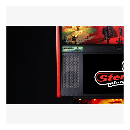 Premium Stern Pinball The Walking Dead.  Close-up of a Stern pinball machine with a colorful display and branding.