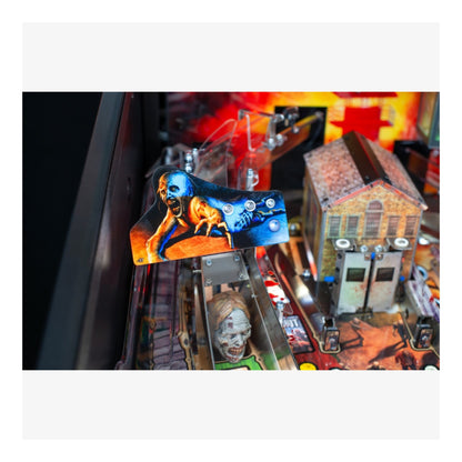 Premium Stern Pinball The Walking Dead. Close-up of a pinball machine with detailed artwork and vibrant colors.