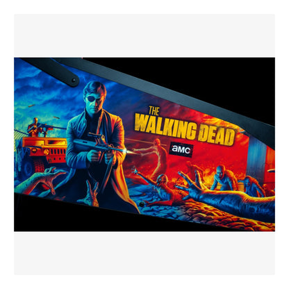 Premium Stern Pinball. Promotional graphic for 'The Walking Dead' with a character holding a gun and zombies in the background, featuring the AMC logo.