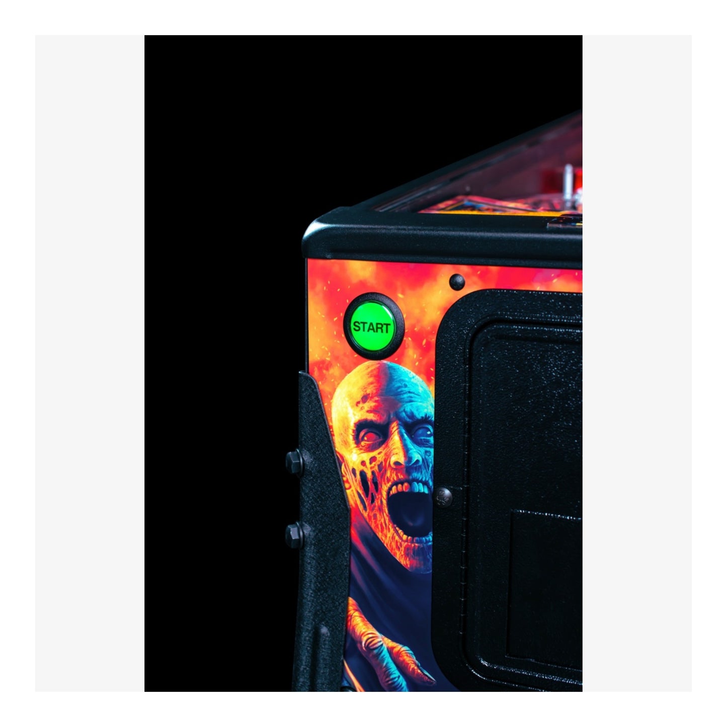 Premium Stern Pinball. Vertical close-up of the lower playfield and flippers on The Walking Dead pinball.