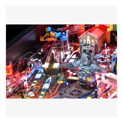 Premium Stern Pinball The Walking Dead.  Close-up of a pinball machine with various game elements and lighting effects.
