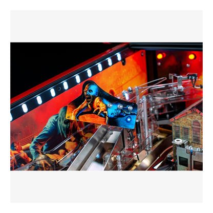 Limited Edition Stern Pinball. Close-up of a pinball machine with a player figure and colorful playfield.