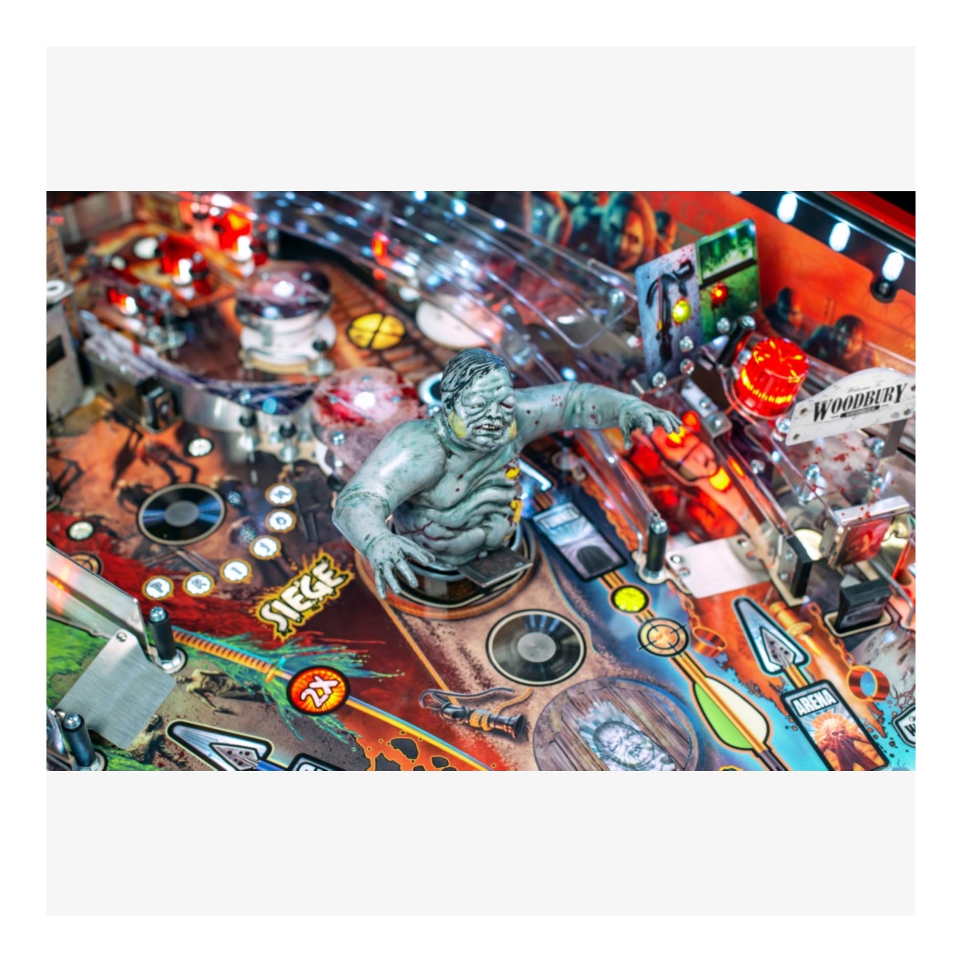 Limited Edition Stern Pinball. Close-up of a pinball machine with a figure and colorful playfield