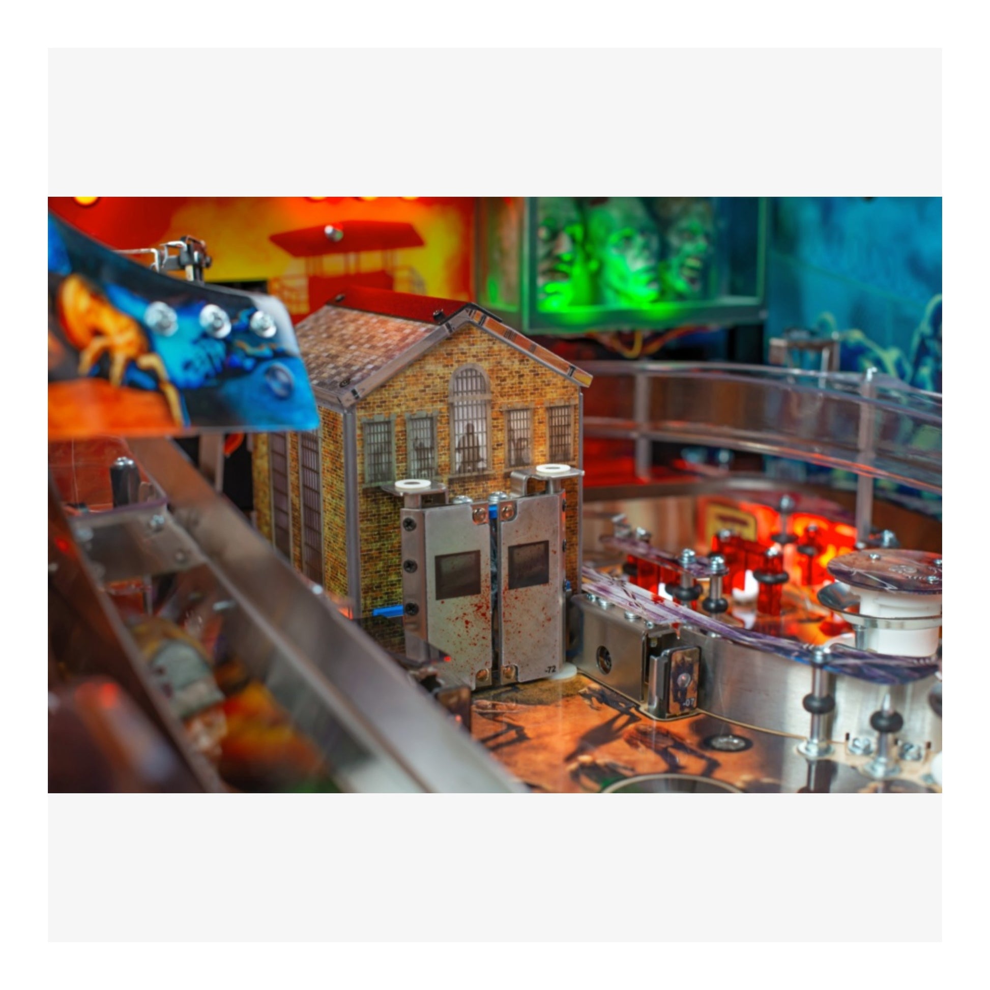 Limited Edition Stern Pinball. Close-up of a pinball machine with colorful artwork and mechanical components.