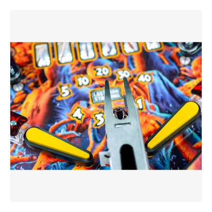 Limited Edition Stern Pinball. Close-up of a slot machine with colorful symbols and numbers on a white background