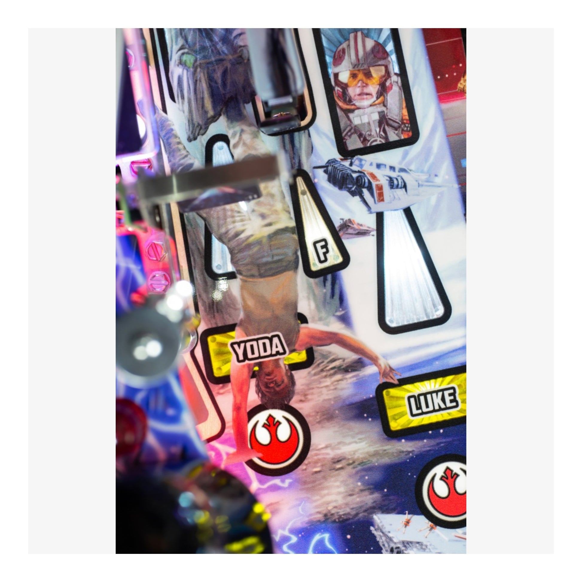 Premium Stern Pinball Colorful pinball machine with Star Wars-themed artwork and characters.