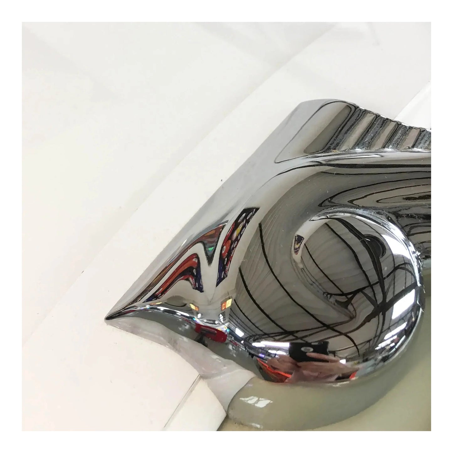 Chrome jukebox part on a white background