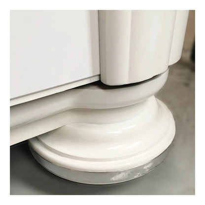 A styled shot of the Gloss White Bubbler in a modern room setting.