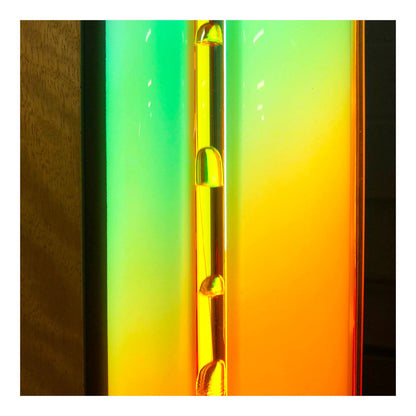 Gradient of green to orange with a metallic chain in the center