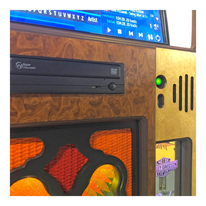 Close-up of a vintage-style entertainment console with a DVD player and screen.