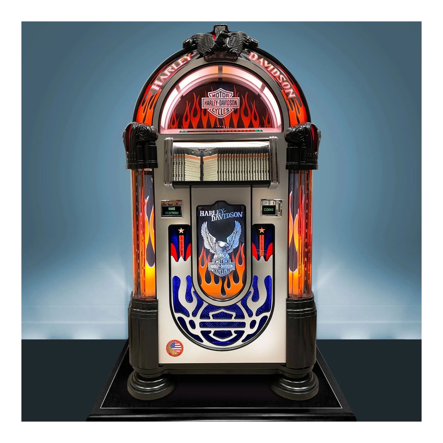 Harley-Davidson-themed jukebox with flames and logo on a blue background