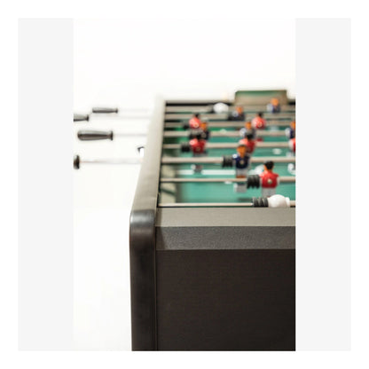 A close-up of the Ideal Worldcup foosball table's side, showing the black handles on the chrome telescopic rods and the manual score keeper.