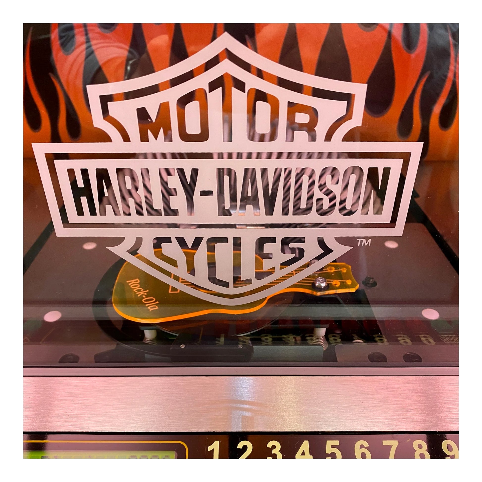 Harley-Davidson logo on a product with flame design