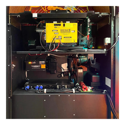 An interior view of the Rock-Ola jukebox, showing the 100-CD capacity magazine.
