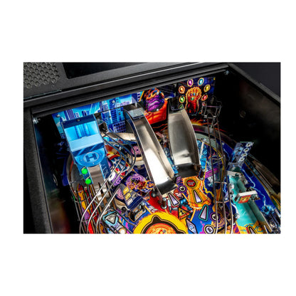 Close-up of a colorful pinball machine with vibrant graphics and mechanical components.