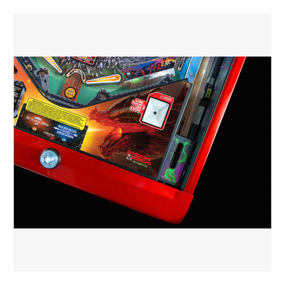 Close-up of a pinball machine with vibrant colors and detailed artwork.