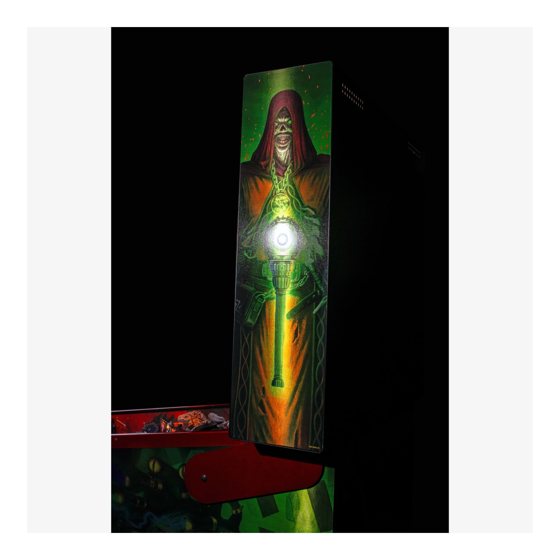 Artistic depiction of a hooded figure with glowing green energy, framed against a dark background.