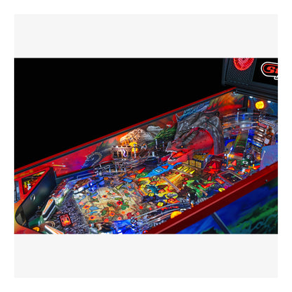 Pinball machine with colorful artwork and lights on a black background