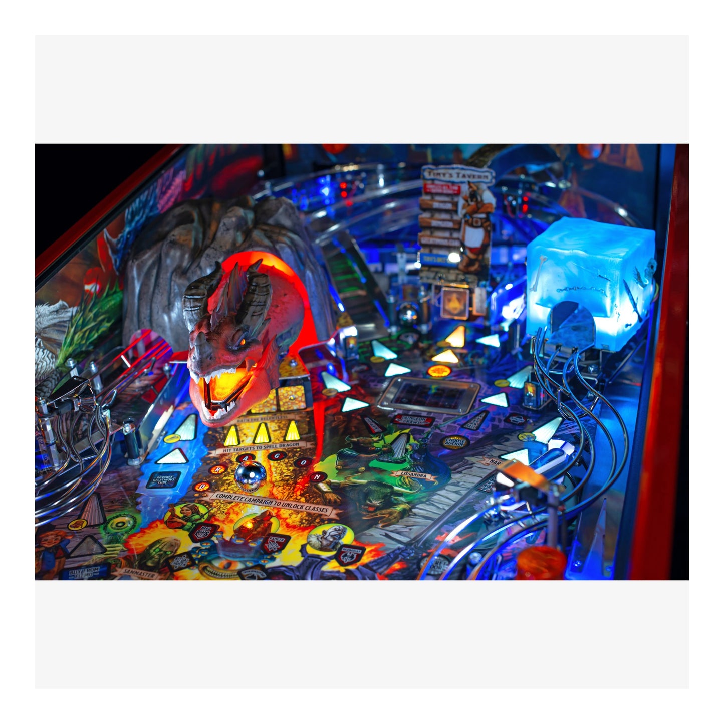 Close-up of a colorful pinball machine with vibrant lights and details.