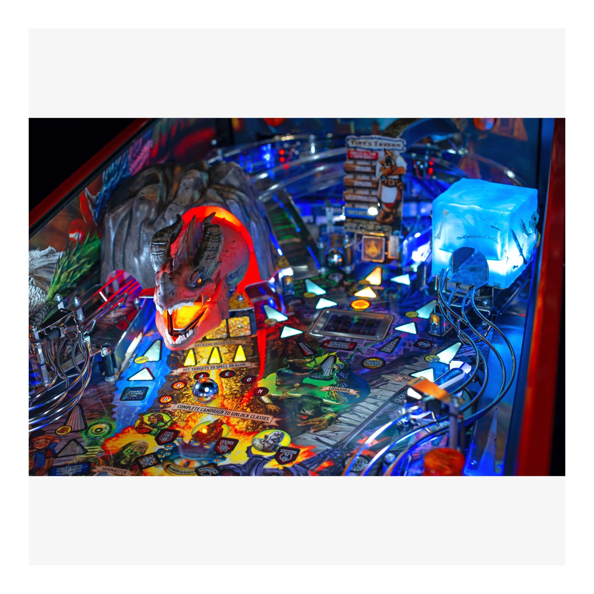 Close-up of a colorful pinball machine with vibrant lights and details.