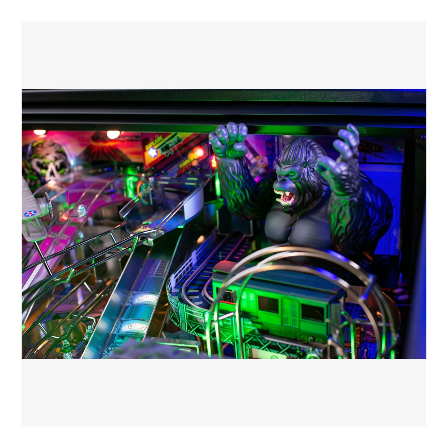 Pinball machine with a werewolf figure and colorful playfield