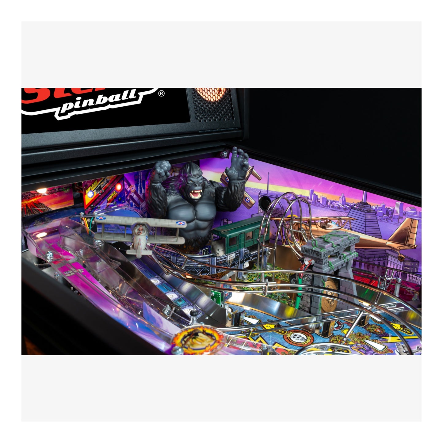 Pinball machine with colorful design and 'Bally Pinball' branding.