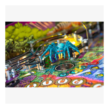 Colorful pinball machine with a detailed playfield and a blue spider figure.