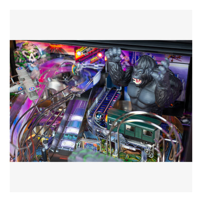 Pinball machine with a gorilla figure and colorful playfield
