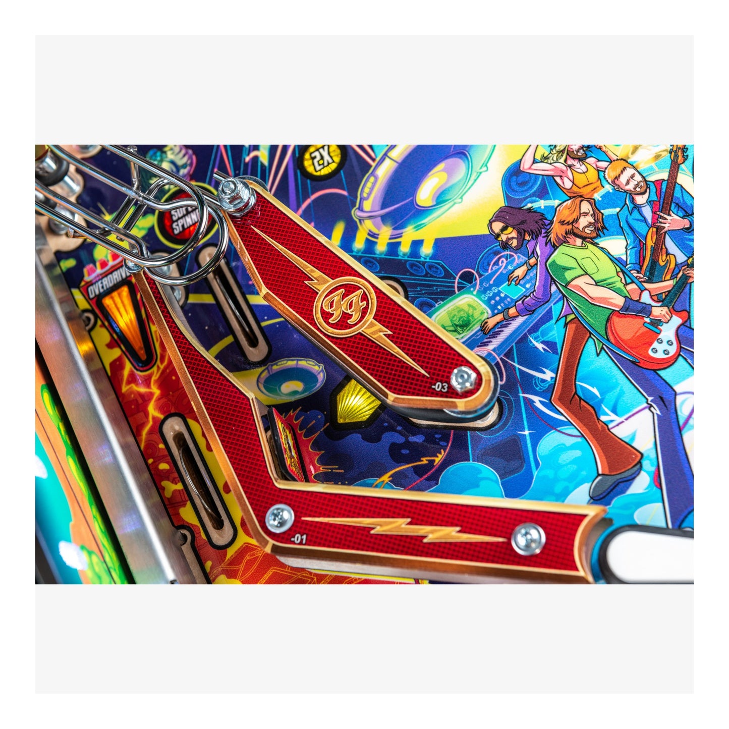Colorful pinball machine with detailed artwork on a white background