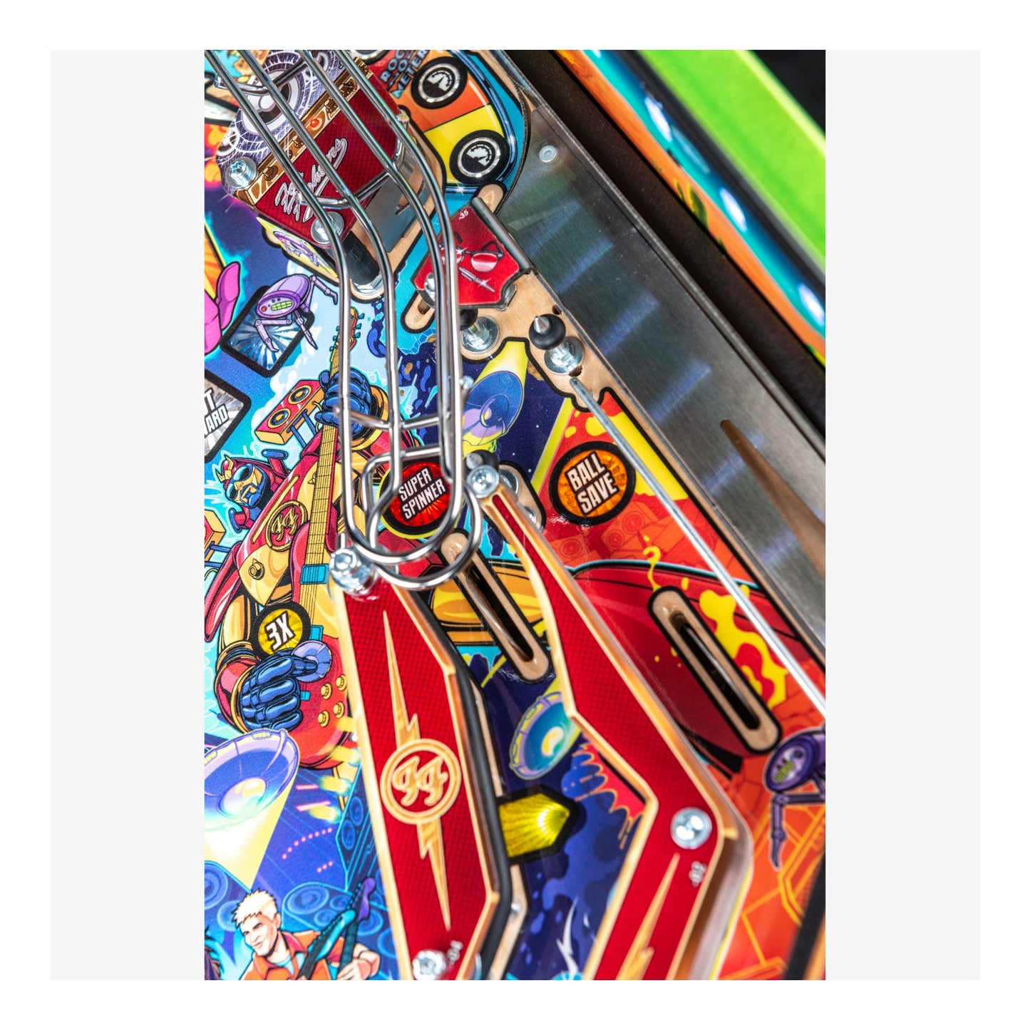 Close-up of a colorful pinball machine with detailed artwork and vibrant colors.
