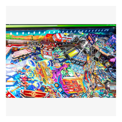 Colorful pinball machine with various symbols and lights on a white background